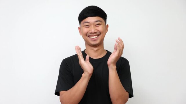 Happy Asian Man Clapping and Giving Thumbs Up