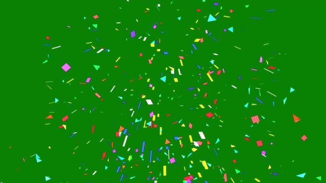 Colorful paper confetti falling explosion loop on green background with bright rainbow party streamers for festive video overlay
