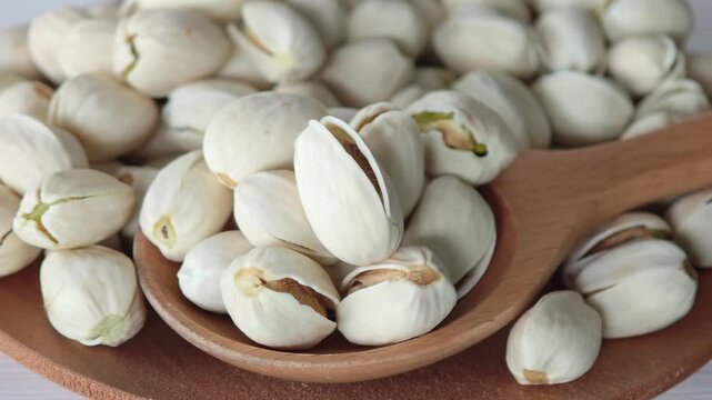 Pistachios nuts background. Pistachio texture.