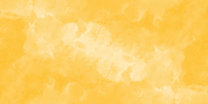 Yellow watercolor wash background with soft cloud like textures and blended gradients ochre amber golden texture