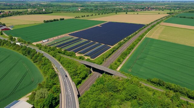 Solar Farm Aerial Zoom In Large Scale Green Landscape