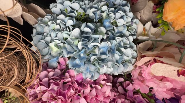 Floral arrangement with hydrangeas and roses