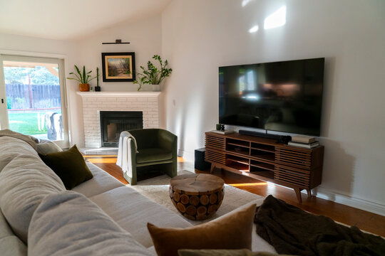 home interior cozy modern living room in afternoon natural light tv