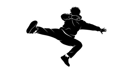 Obraz premium Black silhouette of man kicking in martial arts pose
