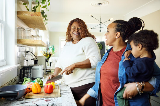 Cooking With Family in a Bright Kitchen Setting