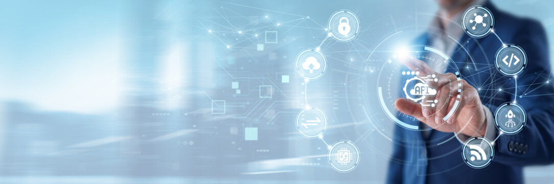 API, Businessman touching application programming interface and networking data, cloud integration services, digital software connection, secure data exchange technology