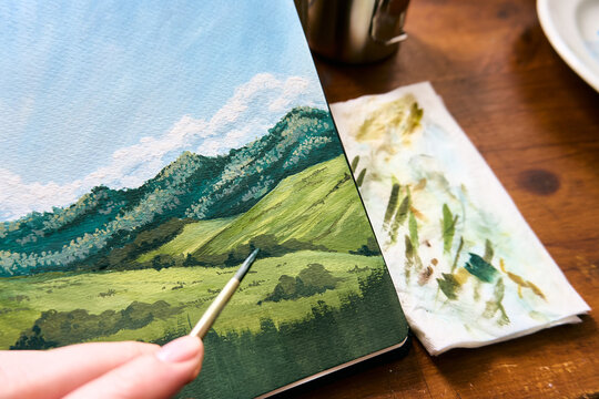The paintbrush, the masterpiece, and stains on a piece of paper