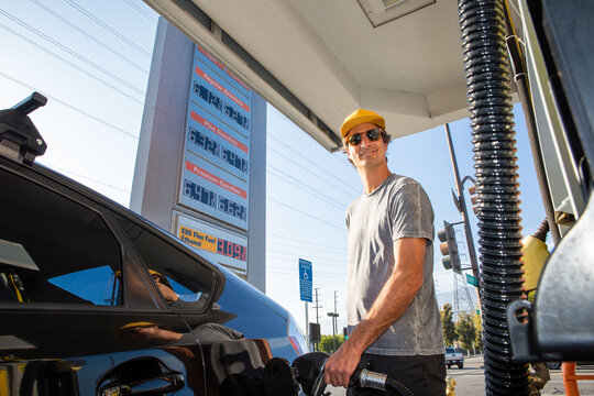Man Paying High Prices for Gas