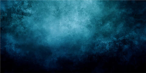 Obraz premium Dark blue textured smoky clouds with grunge effect and abstract atmospheric background.