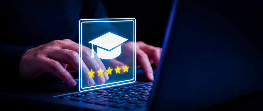 Hands typing on laptop with online education rating icon