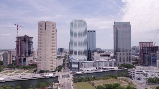 Pullback aerial drone shot revealing downtown Tampa skyline and riverfront