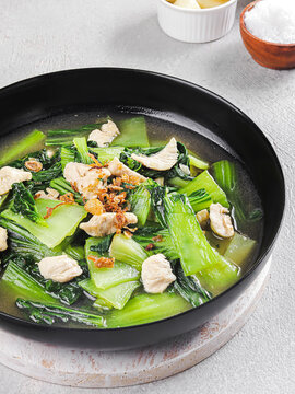 Healthy Homemade Chicken & Bok Choy Soup in Black Pan