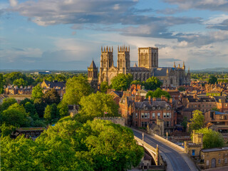 Fototapeta premium York city centre and York Minster in North Yorkshire, England, viewed across the historic skyline. Iconic church and medieval architecture in a popular UK tourism destination.