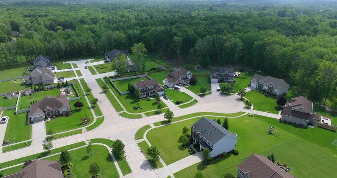 American dream homes as example of real estate development in US suburbs. View from above of residential houses in living area in Cleveland, Ohio.