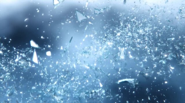 Slow motion static close up of shattered glass fragments exploding and scattering in studio with cool blue backlight and bokeh highlights