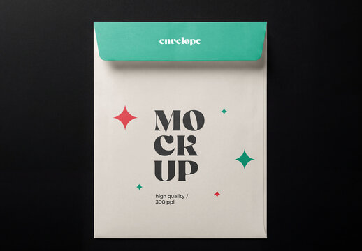 Top view of a vertical C4 or A4 paper envelope mockup with a closed green flap isolated on a solid black background