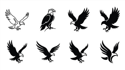 Naklejka premium Black and white eagle silhouettes flying icons Vector