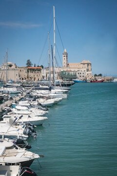 Boats from the old port and the panorama of the city of Trani; Province of Barletta&ndash;Andria&ndash;Trani, Puglia, Italy