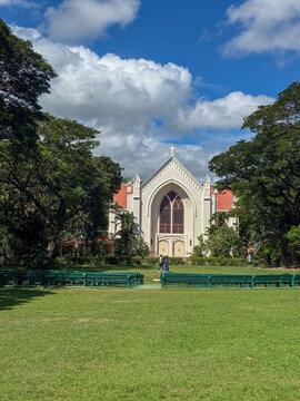 Silliman University Church facade behind a green lawn