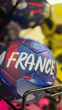 Soulac-sur-Mer, Medoc, France - June 12, 2026. Close-up of an official France national football team soccer ball on a display rack in Carrefour supermarket.