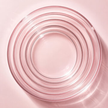 Stacked Pink Glass Petri Dishes Top View Abstract Beauty Laboratory Background.