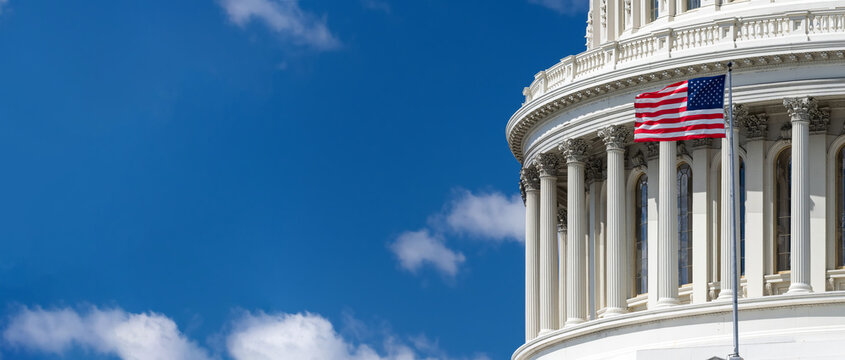 Historic Capitol Dome And American Flag Representing Federal Government Authority