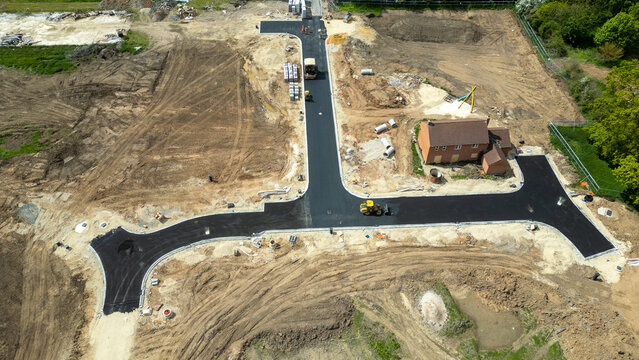Construction Site with New Road and House at Bellway Homes in Boroughbridge, UK.