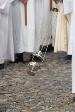 Thurible in motion during a Catholic procession