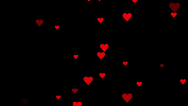 Falling festive confetti small hearts confetti. Valentines day hearts icon falling animation on black screen background. Romantic red heart flying 4k video. 3d red hearts falling abstract animation.