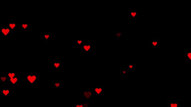 Romantic red heart flying 4k video. Soft scattered cloud of red hearts floating on a black background. love heart 4k video,pink and red hearts gracefully falling on a alpha channel. 