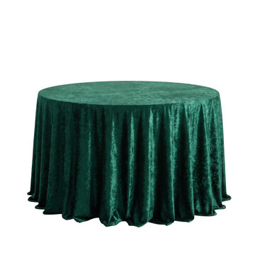 A round table covered with a dark green velvet tablecloth isolated on transparent background