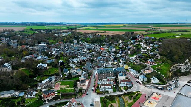 Normandy coastal village of Veules-les-Roses seen from drone. Houses and streets in scenic French seaside setting