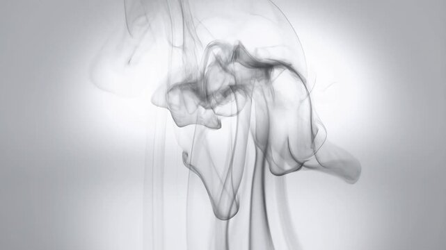 Mesmerizing flow of abstract smoke clouds in motion over white background