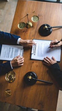 Legal Agreement and Scales of Justice in Business and Law Environment