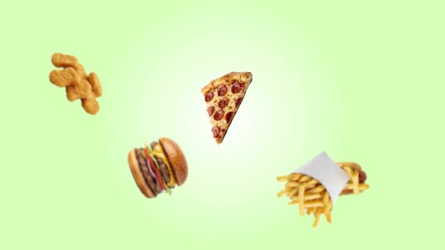 Flying fast food assortment with pizza burger and fries on green gradient background