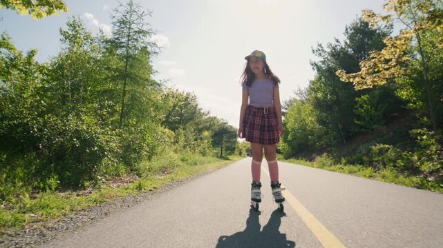 A young girl glides gracefully on roller skates along a sunlit trail surrounded by vibrant greenery, playfully interacting with her beautiful surroundings