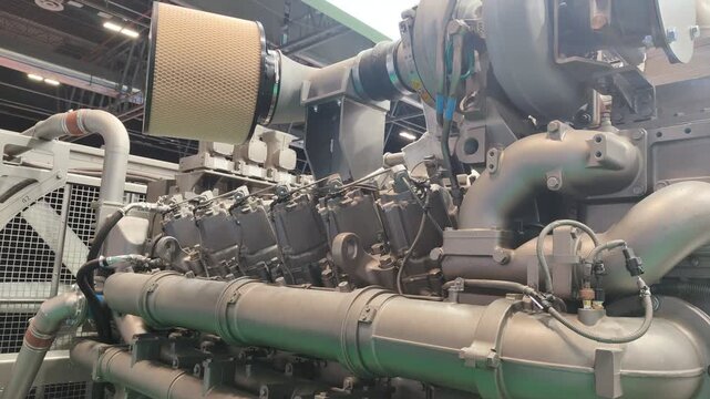 Industrial diesel generator engine powering a factory