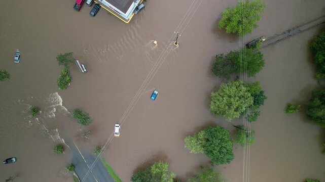 Massive flooding engulfs Bedford, Halifax, as relentless rain causes rivers to overflow. Roads are covered and cars are trapped in the rising waters of this stormy chaos