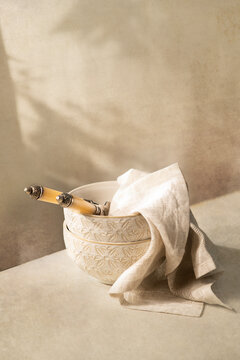 Cream bowls on a cream background 
