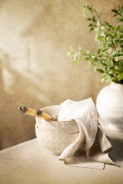 Cream bowls on a cream background 