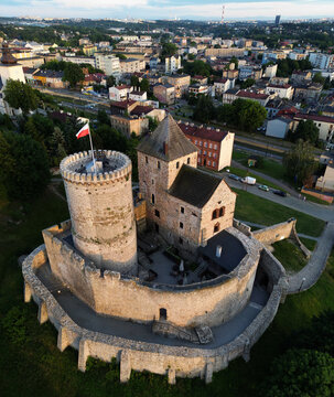 Aerial bird's-eye view of the medieval Bedzin Castle with the town cityscape in the background, Poland.