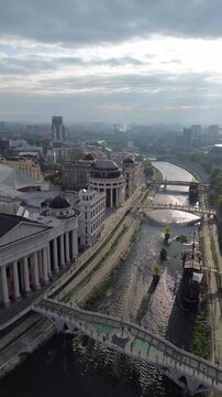 City view of Skopje, North Macedonia shows buildings along the Vardar River in daylight