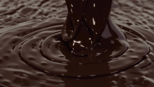 Dark Chocolate Stream Creating Concentric Ripples in Ganache Pool

