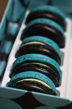 Light blue and black macarons