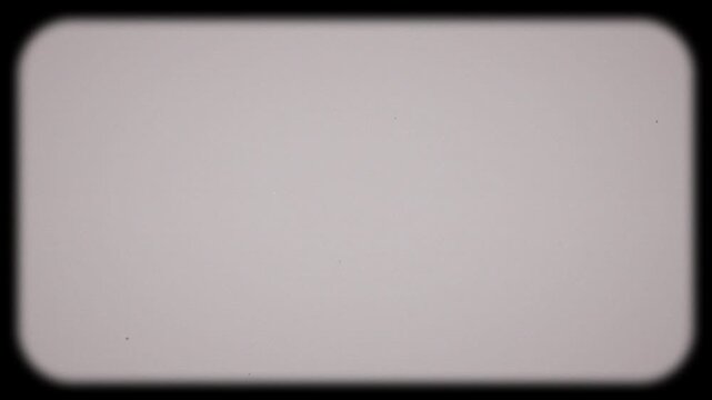 Minimalistic vintage projector frame overlay with soft focus gray screen and rounded border. 4K Video