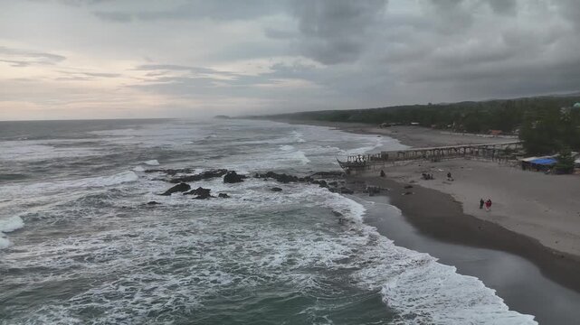 Aerial Coastal View of Jayanti Beach Waves and Shoreline in West Java Indonesia