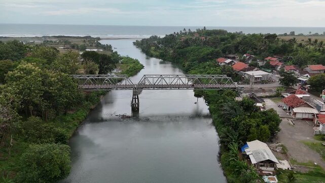 Aerial View of River Bridge Near Pantai Cemara Coastline in Cianjur West Java Indonesia