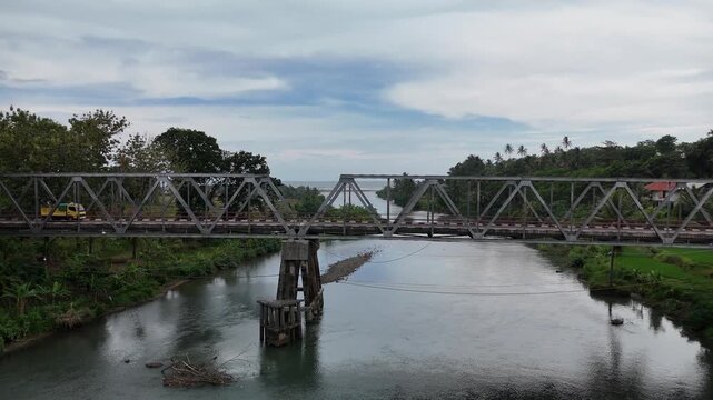 Ascending Drone Shot Above River Bridge and Estuary in Cianjur West Java Indonesia