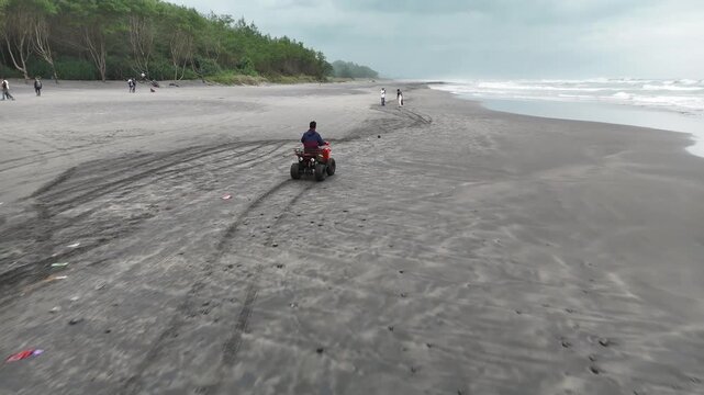 ATV Riding Activity on Pantai Cemara Beach in Cianjur West Java Indonesia