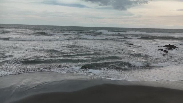 Drone Zoom Out View of Ocean Waves at Jayanti Beach Cidaun West Java Indonesia
